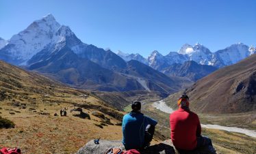 Two men enjoying the view of Khumbu region