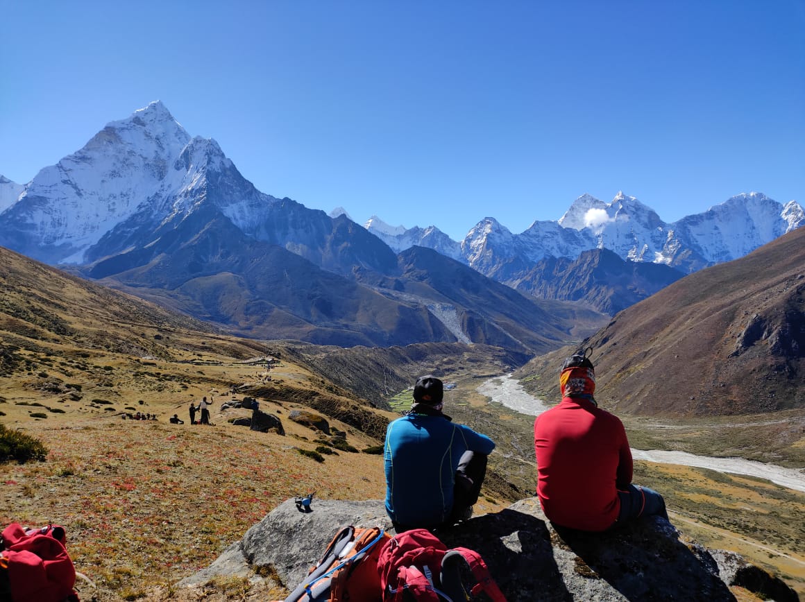 Two men enjoying the view of Khumbu region