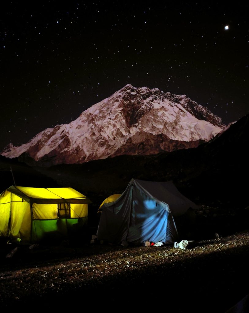 Night shot photo of mt. Nuptse touching the sky and the stars in the everest trekking region
