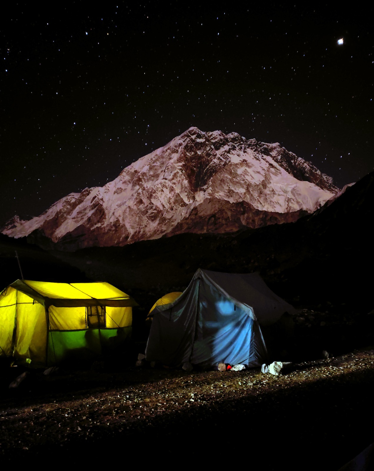 Night shot photo of mt. Nuptse touching the sky and the stars in the everest trekking region