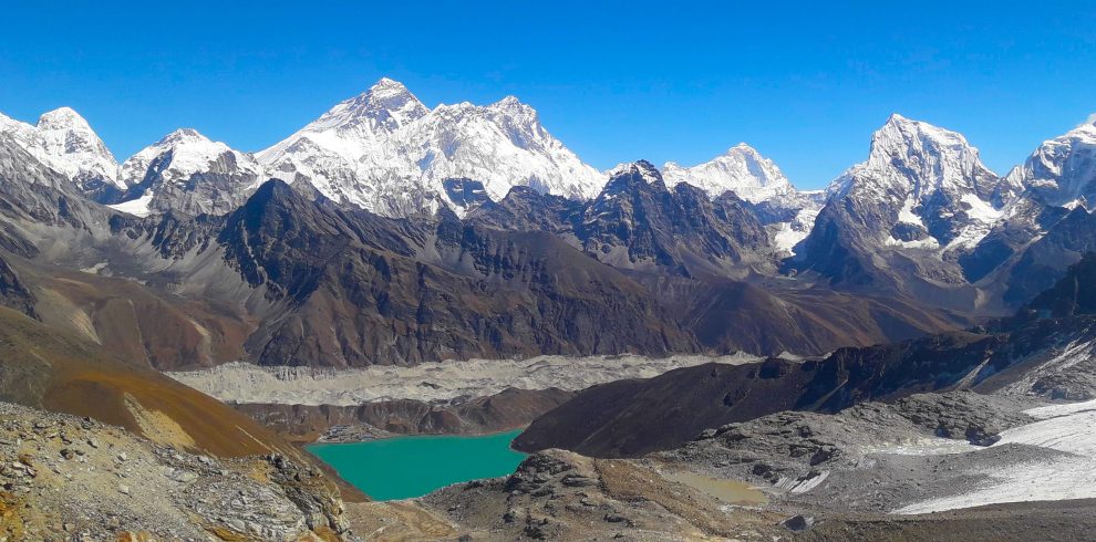 A pond among the glaciers, pass and mountains in the khumbu region of nepal for luxury, budget and standard treks of nepal.